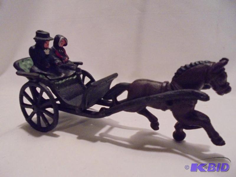 Large antique cast iron horse and buggy with ...