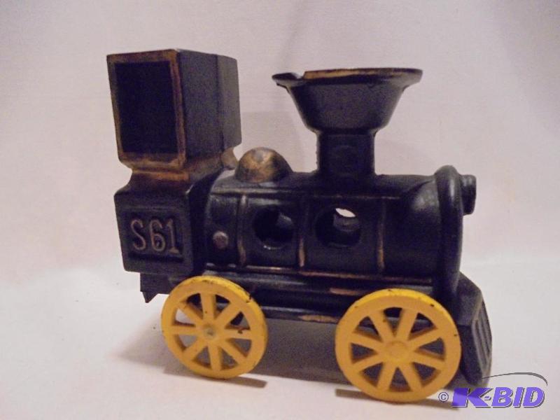 Large antique cast iron train marked S61 with...