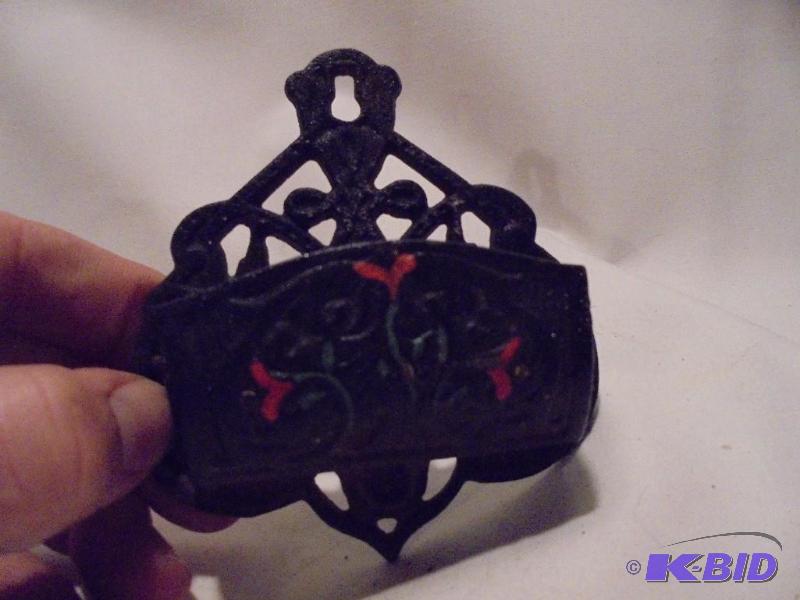 Vintage cast iron matchbook holder with paint...