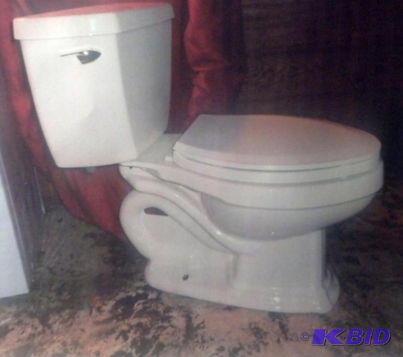 lot 114 image: Complete with no cracks Toilet as shown...