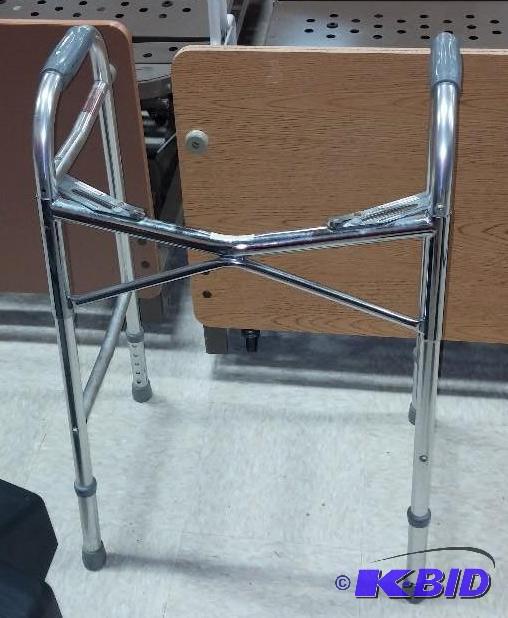 lot 33 image: Folding walker with tips and wheels...