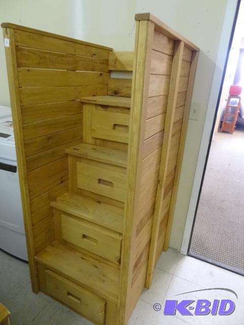 Wood stairs. Built in drawers in steps. Possi...