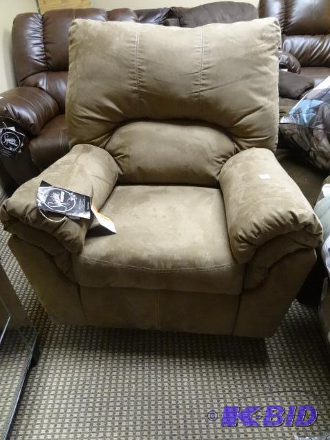Signature design rocker recliner. New. Still ...