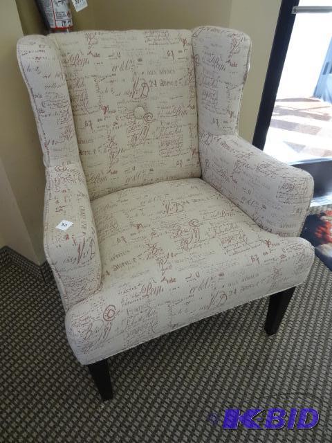 Cushioned side chair. Like new. Still has fac...