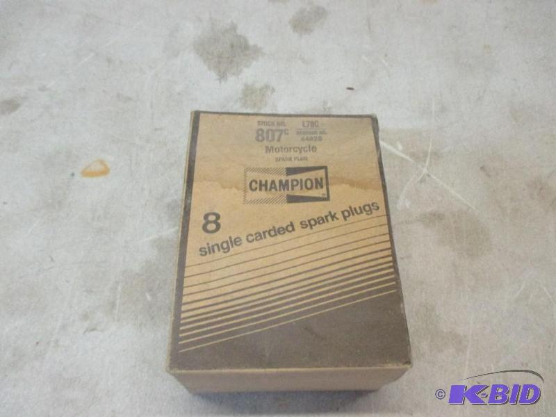 Box of New champion spark plugs. L82C...