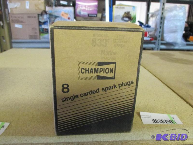 Box of new champion spark plugs, L78V...