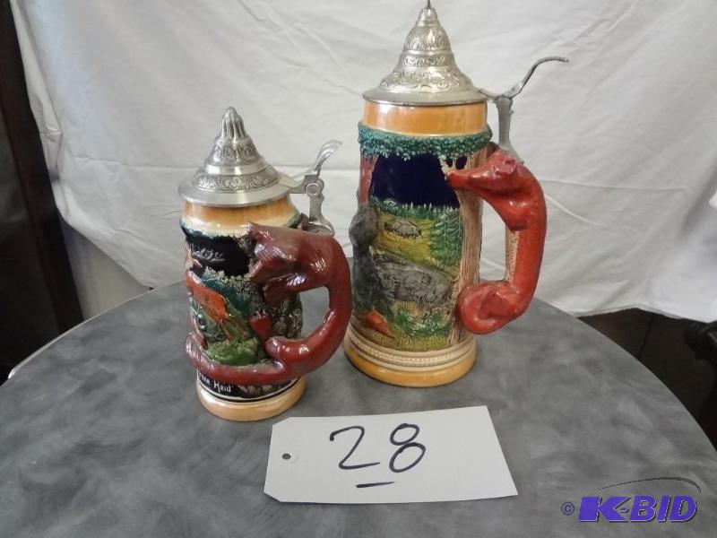 Pair of Fox Handled Steins
