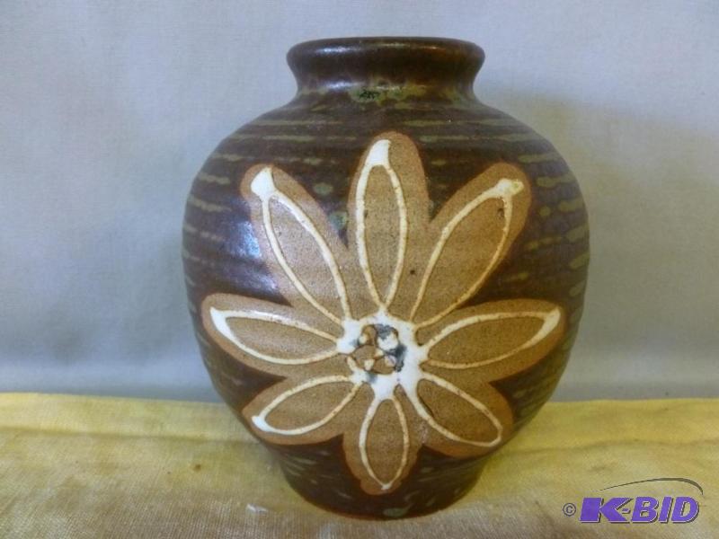 Beautiful hand glazed stoneware vase that mea...