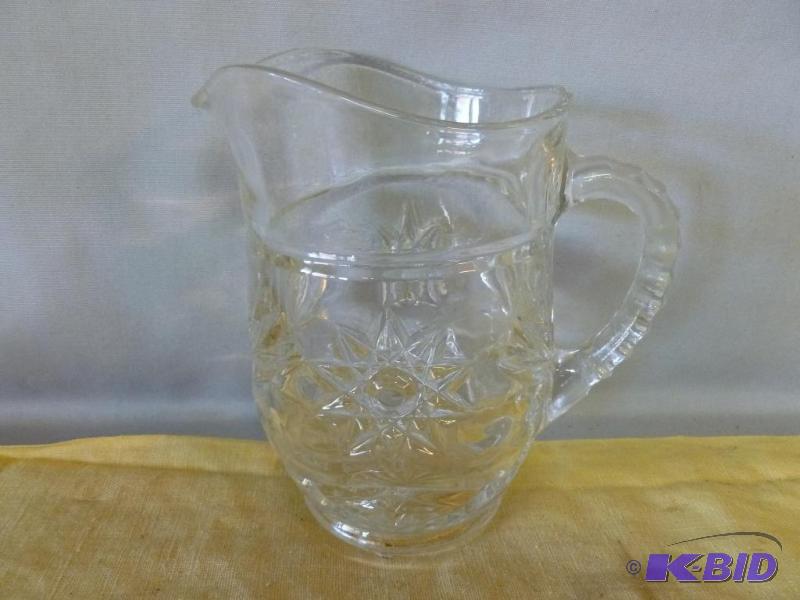 Vintage cut glass pitcher that measures 4&quo...