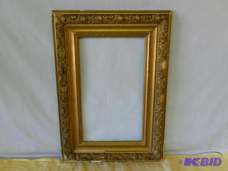 Large antique wooden picture frame that measu...
