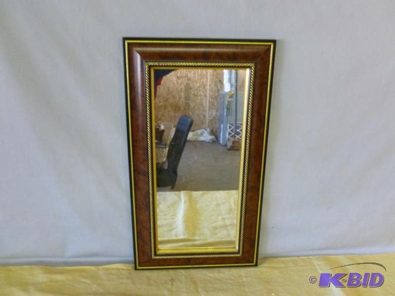 Nice wood framed hall mirror that measures 14...