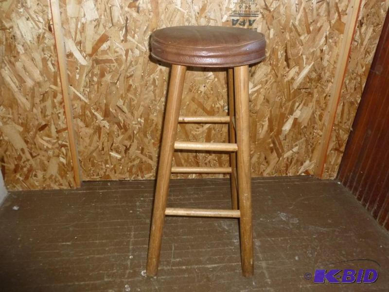 Wooden bodied and padded vinyl seat bar stool...
