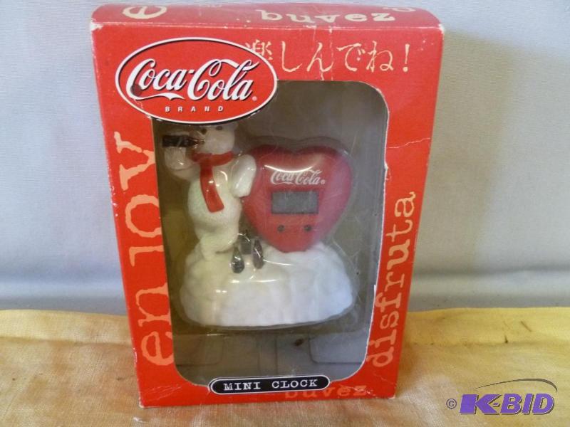 Collectible Coca-Cola mini-clock, new in the ...