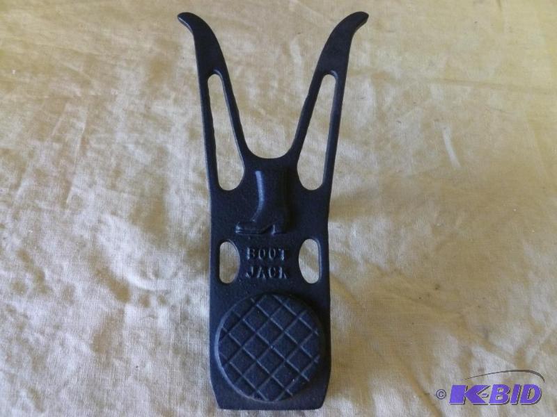 Large cast iron boot jack that measures 5.5&q...