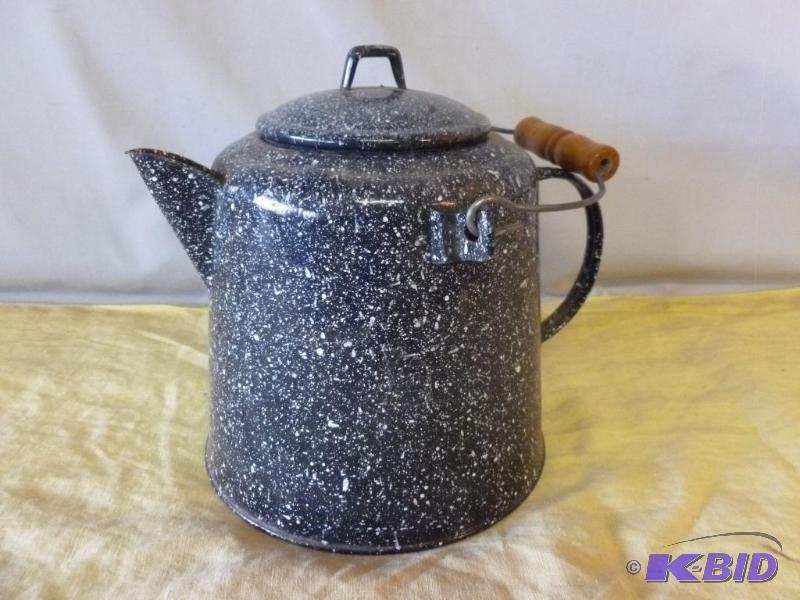 Vintage wood handled enamelware water pot tha...