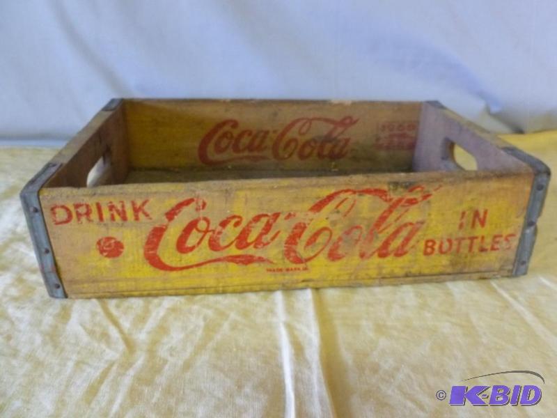 Vintage Coca-Cola wooden soda case that measu...
