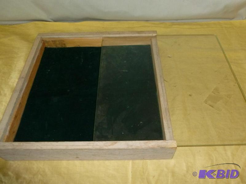 Wood bodied and sliding glass top display cas...