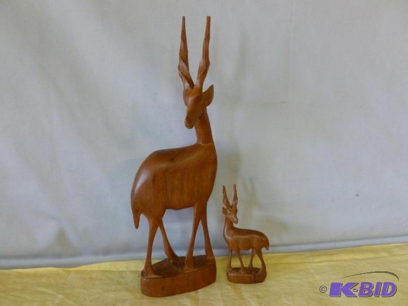 Lot of two hand carved wooden gazelle mantle ...