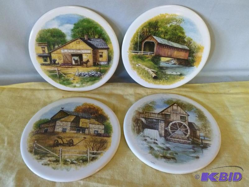 Lot of four large ceramic drink coasters that...