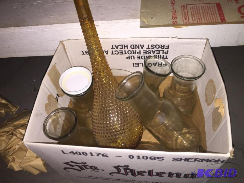 Glass water carafes and vases,...