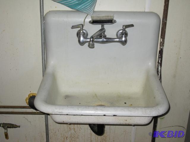 Cast iron hand sink with faucet...
