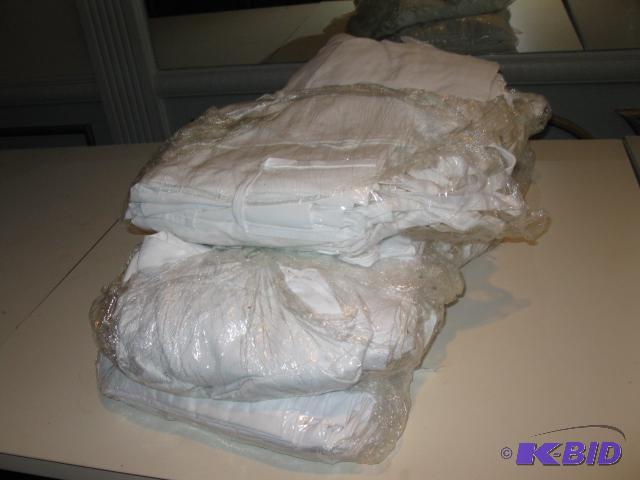 White Aprons approx 8 dozen...