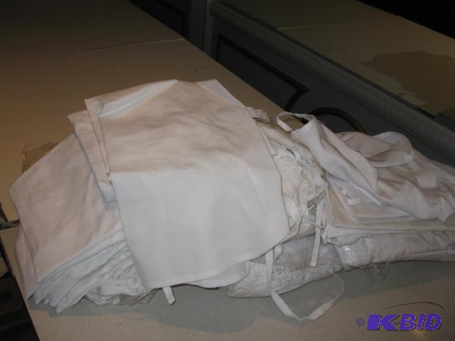 White Aprons approx 6 dozen...