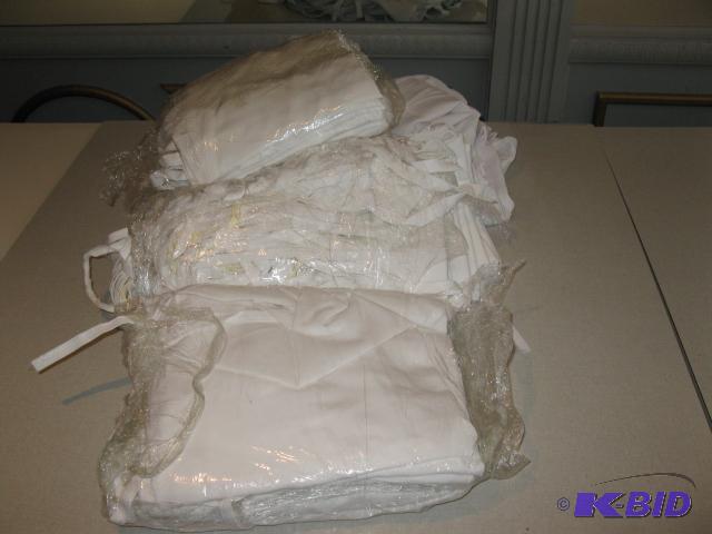 White Aprons approx 6 dozen...