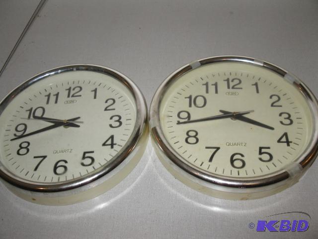 2 wall mounted quartz clocks...