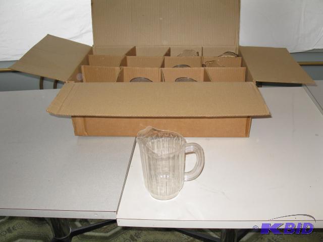 7 plastic water pitchers...