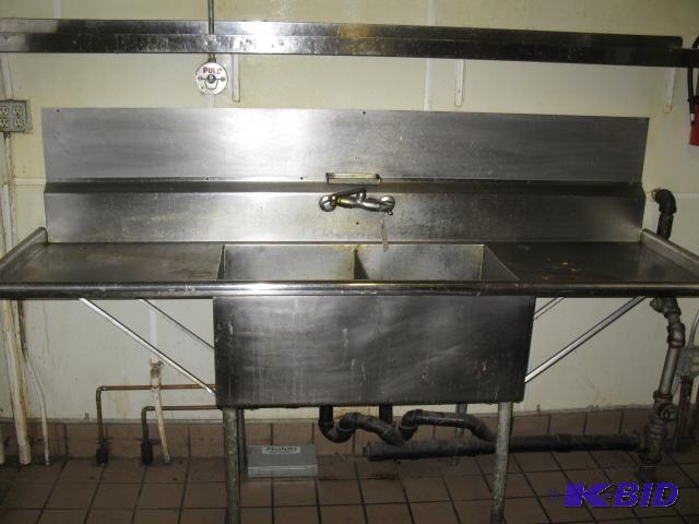 Stainless steel sink with faucet and backspla...