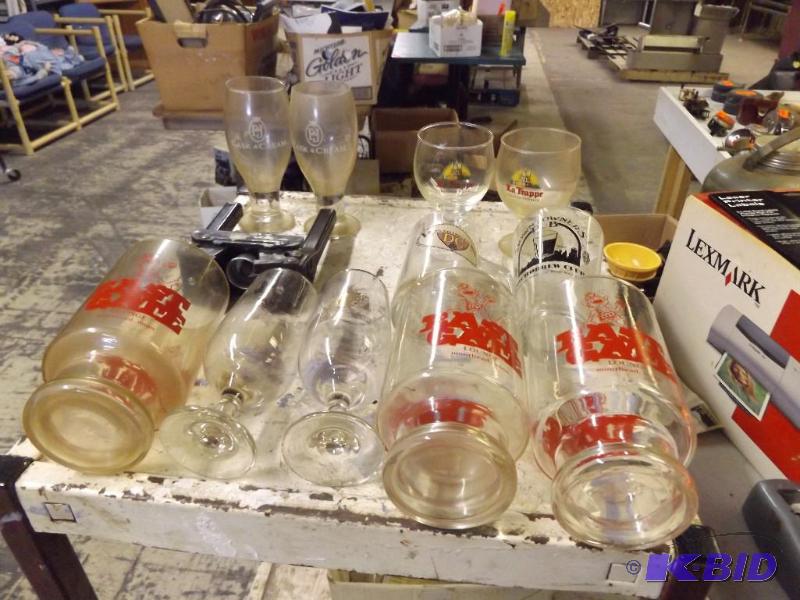 Lot of glasses and a bottle topper...