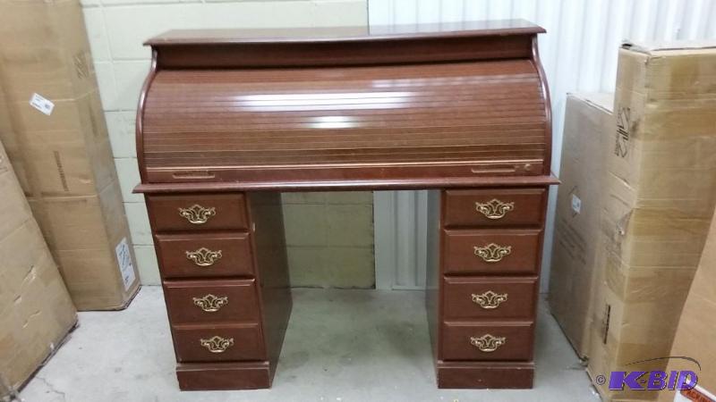 lot 9 image: Roll top Desk.  Shows a lot of Wear.  Functional could be a good project item.