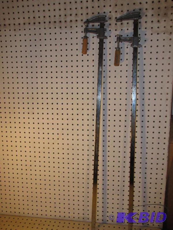 lot 83 image: Two 36 Clamps