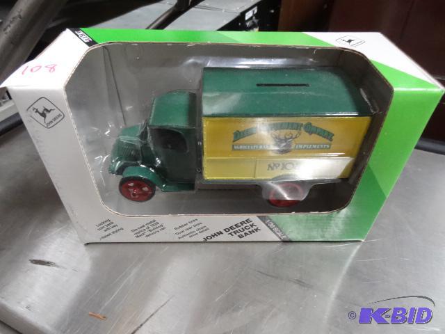 lot 108 image: John Deere truck bank. 138th scale...
