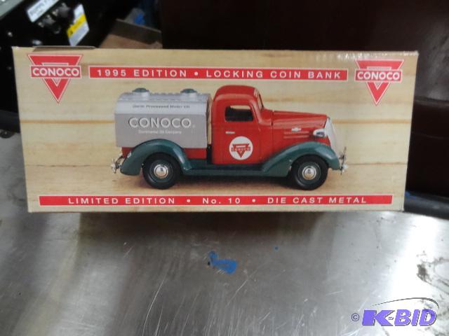 lot 114 image: Conoco 1995 edition locking coin bank. No. 10...