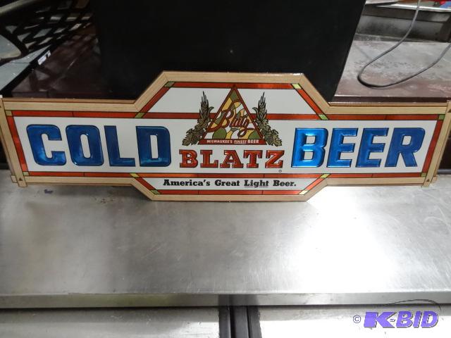 lot 46 image: Blatz beer sign. 36 x 11. Cardboard...