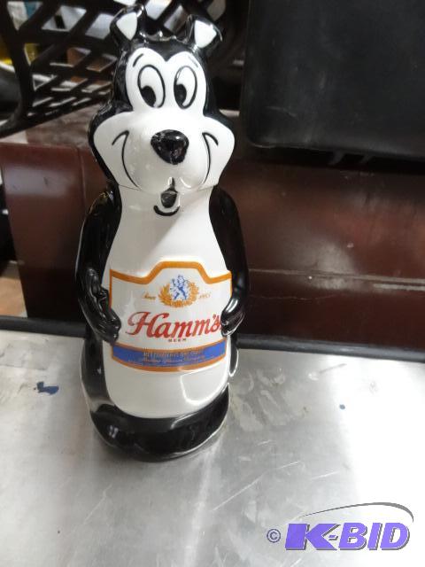 lot 87 image: Hamms beer decanter. 11" tall. Head is o...