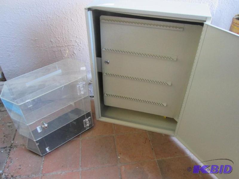 lot 177 image: Metal case 23 inches tall and plastic display...