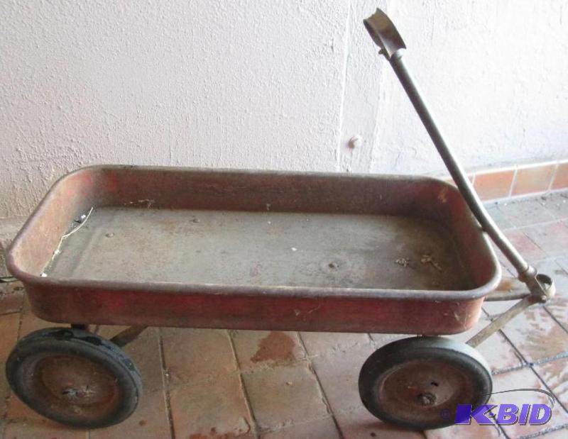 lot 2 image: Vintage metal weagon, wheels turn well and it...