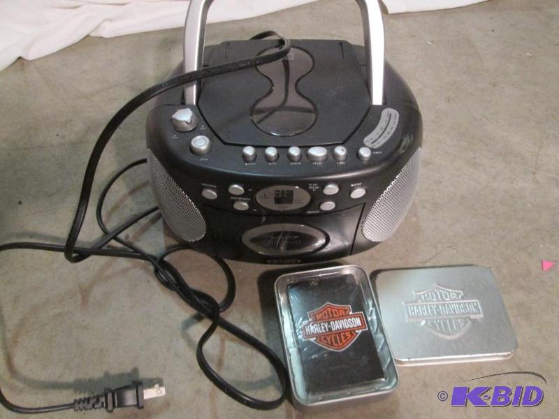lot 246 image: Boom box and new deck of Harley Davidson card...