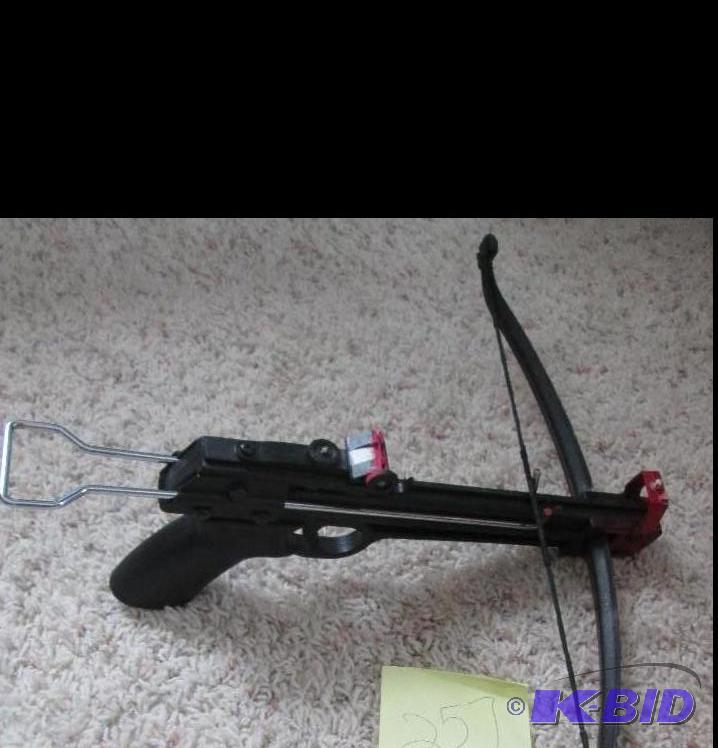 lot 257 image: black made in Taiwan dart gun...