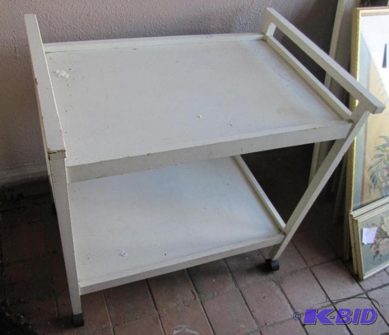 lot 43 image: Wood table on wheels, 30 x 19 and 31 inches t...