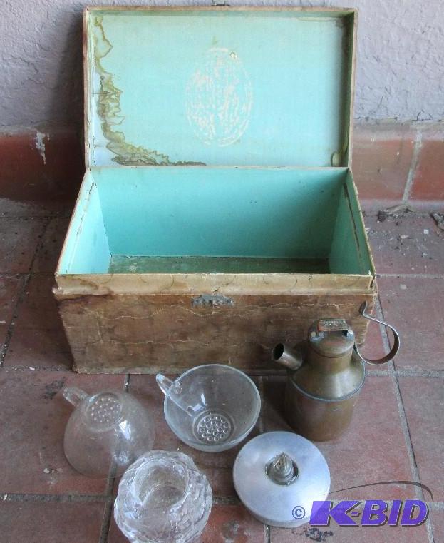 lot 91 image: Vintage case with metal and glassware inside...