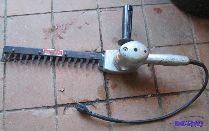 lot 93 image: Black & Decker electric hedge trimmer...