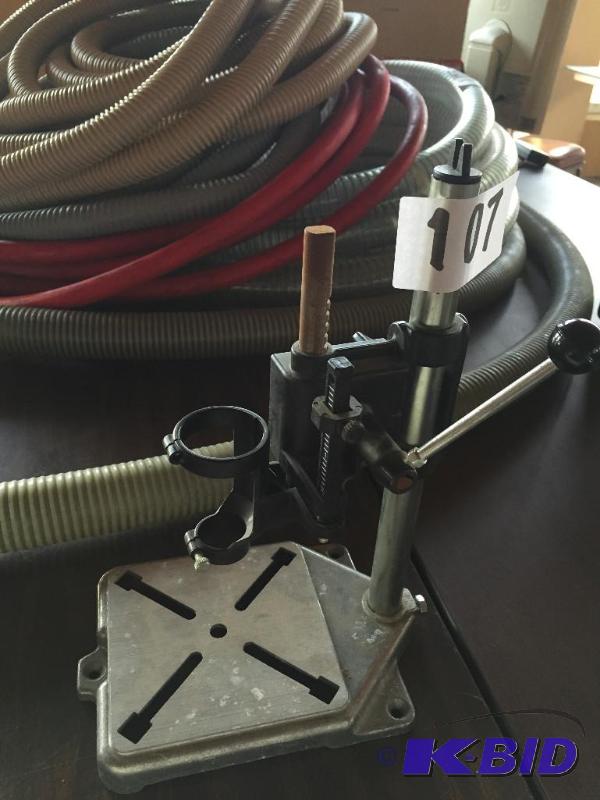 lot 107 image: Dremel Moto-tool drill press stand....
