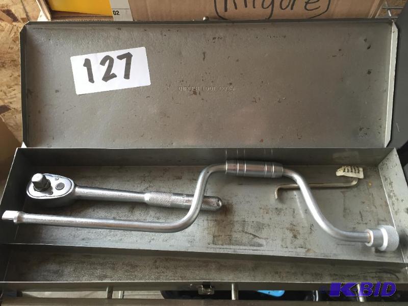 lot 127 image: Ratchet and hand socket....