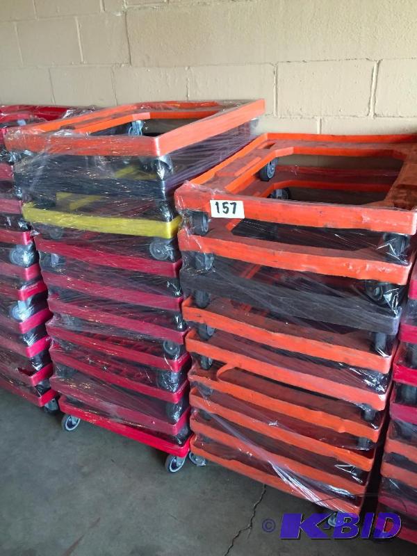 lot 157 image: 2 stacks of rolling plastic carts. 19 total....