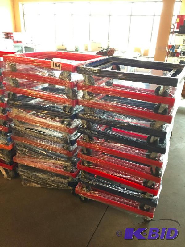 lot 164 image: 2 stacks of rolling plastic carts. 20 total....