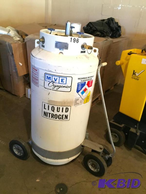 lot 196 image: Liquid nitrogen tank with wheeled cart....